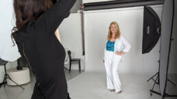 Photographer Rachel Sorbet photographing a client at her Westminster studio